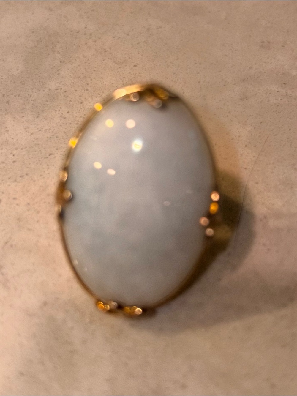 Gold Ring with Large White Oval Stone